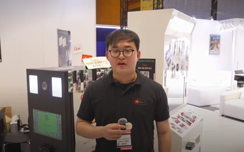 Chiki founder being interviewed at the Space Design Fair booth